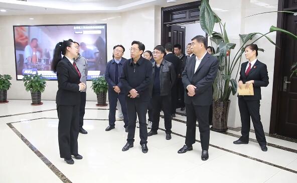 西藏自治区高级人民法院一行到大...